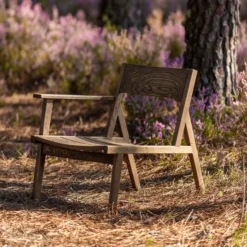 98.6°F Outdoor Lounge Chair Single Arm By Lyndon Neri And Rossana Hu -Finest Furniture Shop 98.6 FOutdoorOneArmedLoungeChairbyNeri HuinblackoiledEuropeanoak photobyCarlosTeixeira