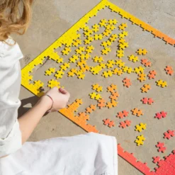 Red And Yellow Gradient Puzzle By Bryce Wilner For Areaware -Finest Furniture Shop GradientPuzzle RedYellow lifestyle 01 15S StellaBerkofsky BWPGRY